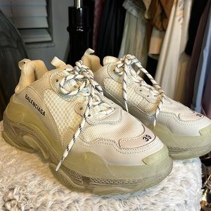 Balenciaga Triple S sneakers in white with clear sole.